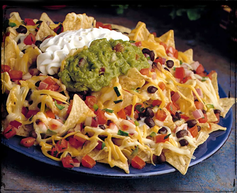 Nacho Supreme with guacamole, sour cream and pico